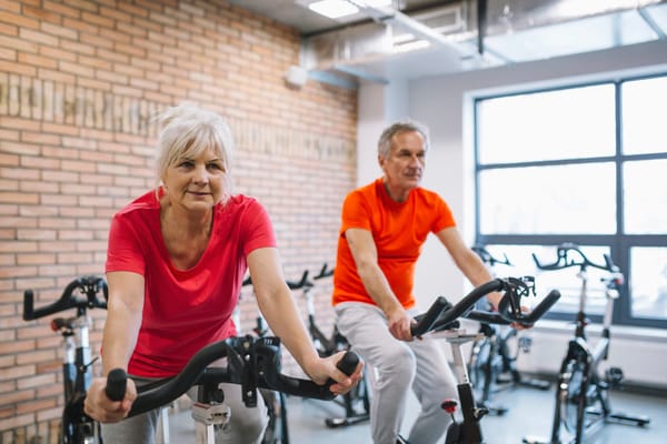 Residents participating in a fitness activity in the gym