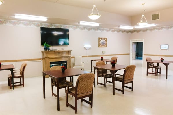 Bright interior common area with tables and chairs
