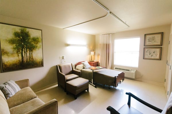 Private resident room with furniture and artwork