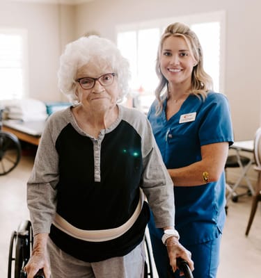A caregiver assisting a resident in a facility