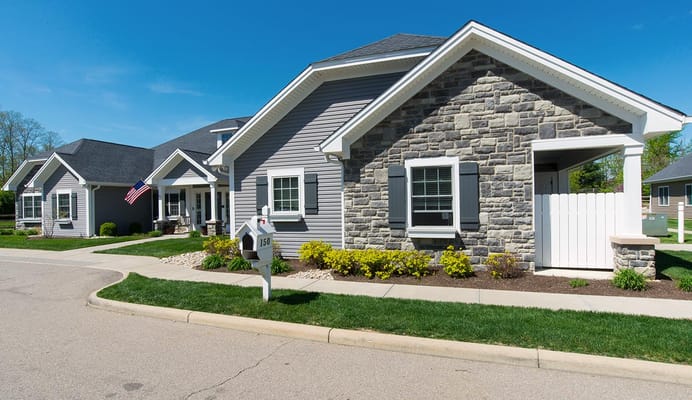 Exterior view of senior living cottages with landscaping