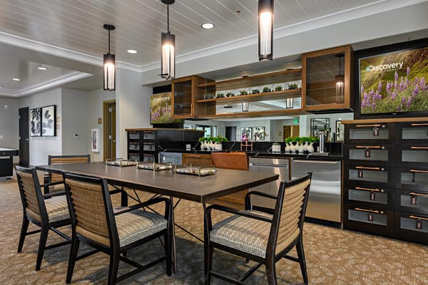 Interior view of a common area with dining setup