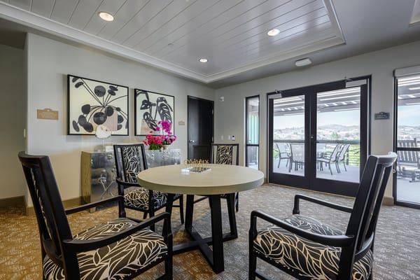 Bright common area with seating and artwork