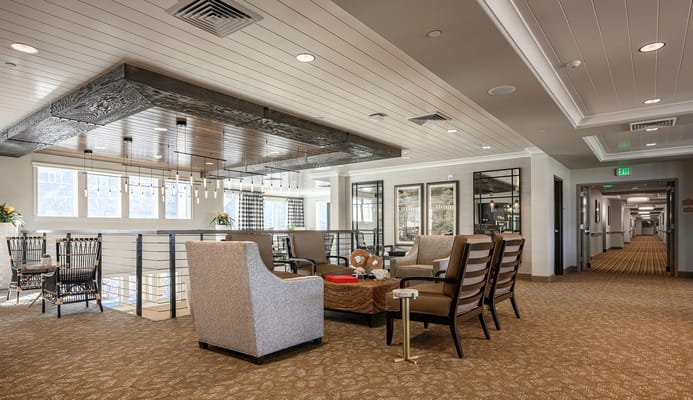 Bright, inviting common area with seating and decor