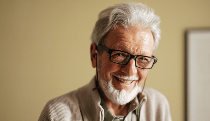 Elderly man smiling warmly