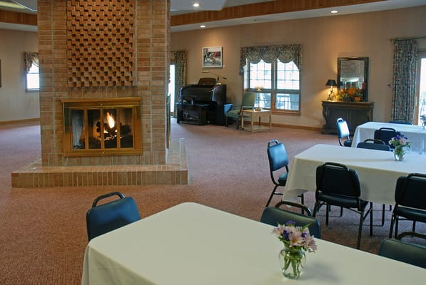Interior common area with seating and fireplace