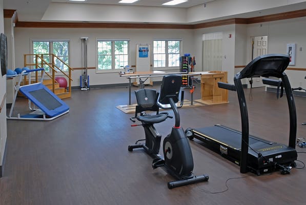 Interior gym with exercise equipment for residents