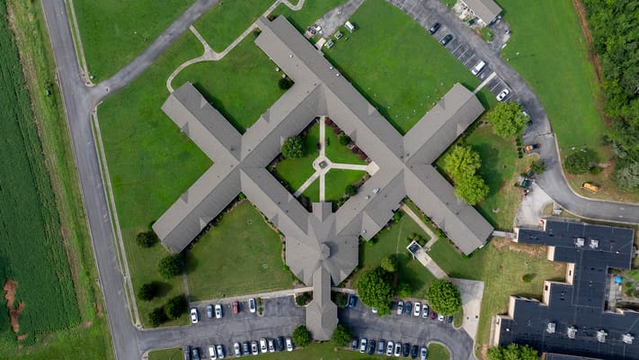 Aerial view of the facility layout and grounds