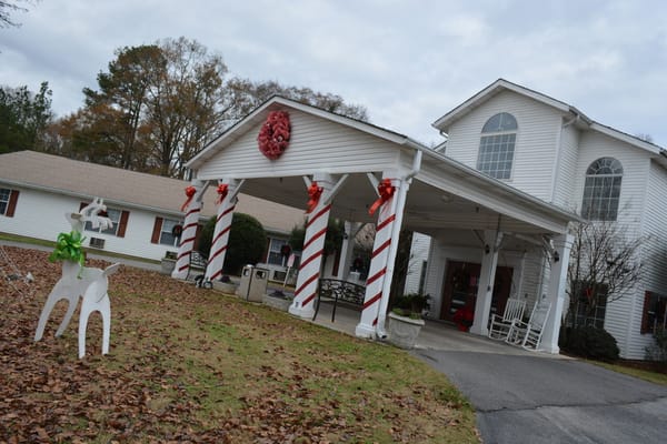 Exterior view of a nursing center decorated for the holidays