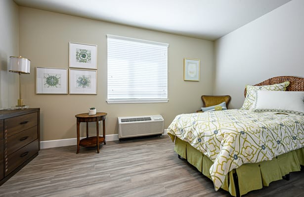 Cozy resident room with bed and decor