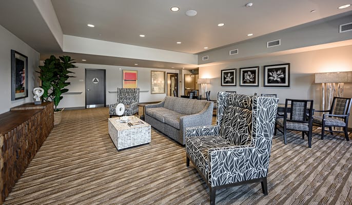 Bright common area with comfortable seating and decor