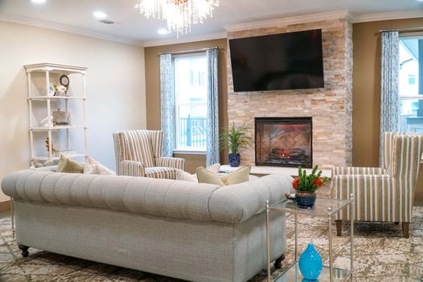 Comfortable interior seating area with a fireplace