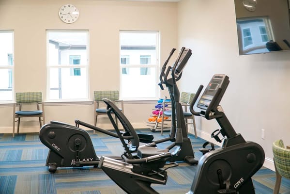 Interior view of a fitness area with exercise equipment