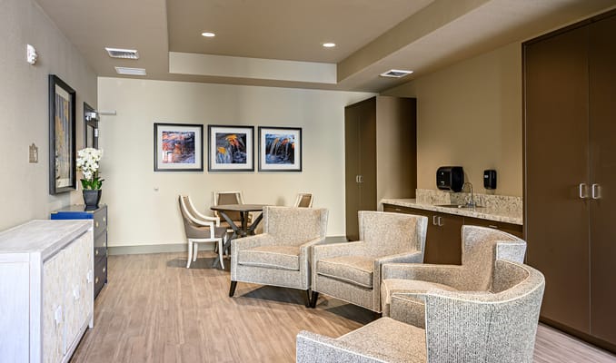 Bright common area with seating and artwork