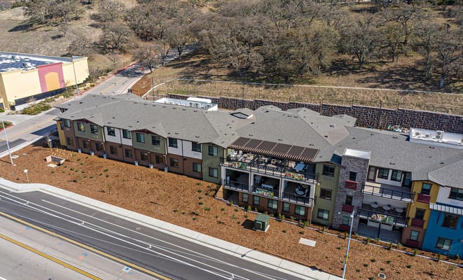 Aerial view of the building with landscaped area