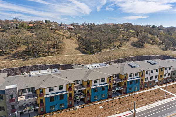 Exterior view of colorful assisted living facility