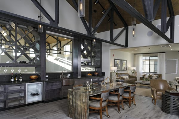 Bright and modern common area with dining furniture