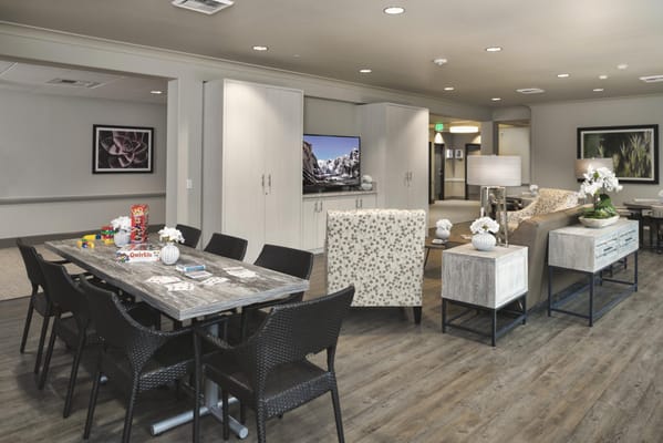 Interior common area with seating and game table