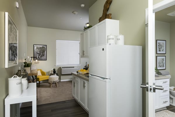 A cozy kitchenette in a resident's suite