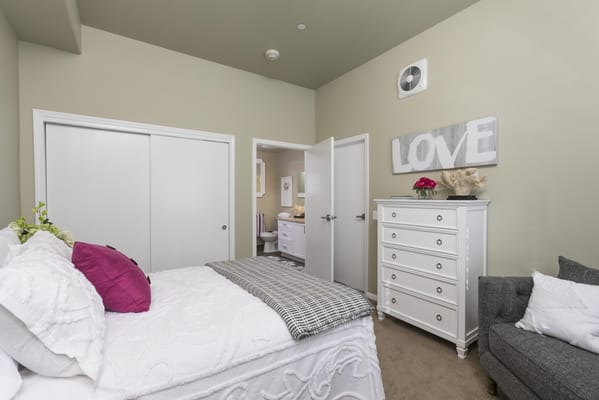 Cozy private resident room with a bed and decor