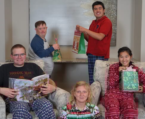 Residents participating in a festive activity in the lounge