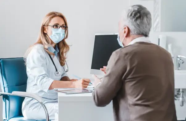 Doctor consulting with a resident in an office