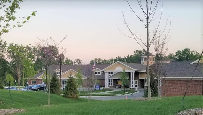 Exterior view of The Willows at Howell against a sunset