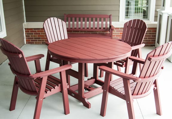 Outdoor patio furniture with a round table and chairs