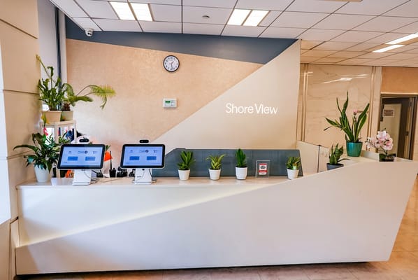 Modern reception area with plants and technology