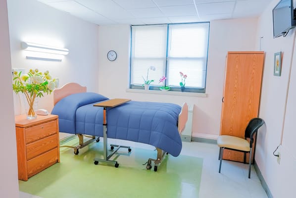 A clean and organized private resident room