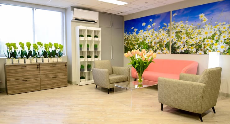 Bright and inviting common area with floral decor