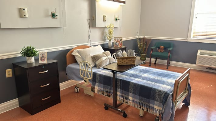 A private resident room with a cozy setup