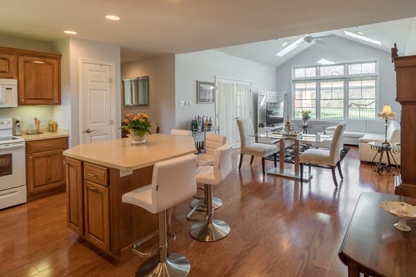 Spacious common area with seating and dining space