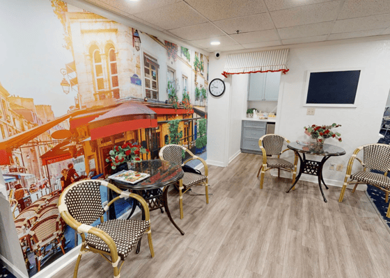 Cozy common area with elegant cafe-style seating.