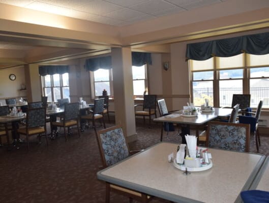 Bright dining room with tables and chairs