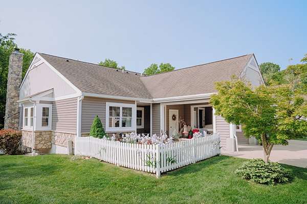 Exterior view of a facility with a garden