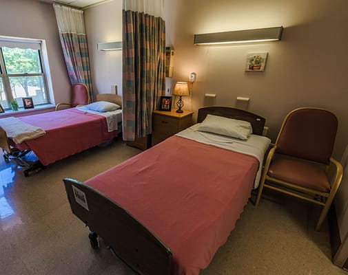 Interior view of a shared resident room with two beds