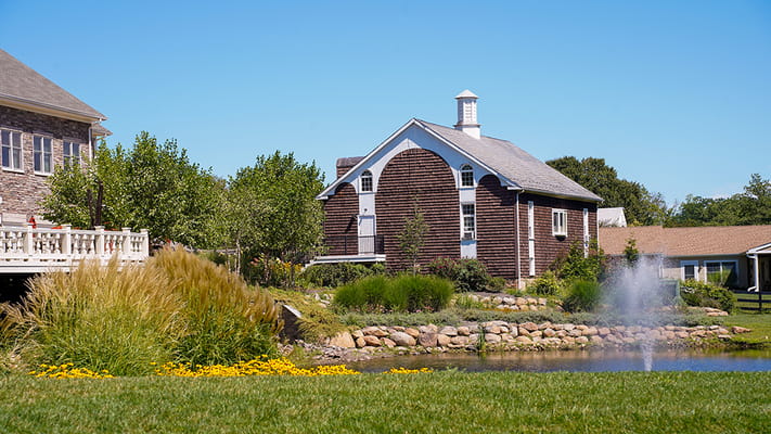 Exterior view of the Garden at Pine Run with landscaping