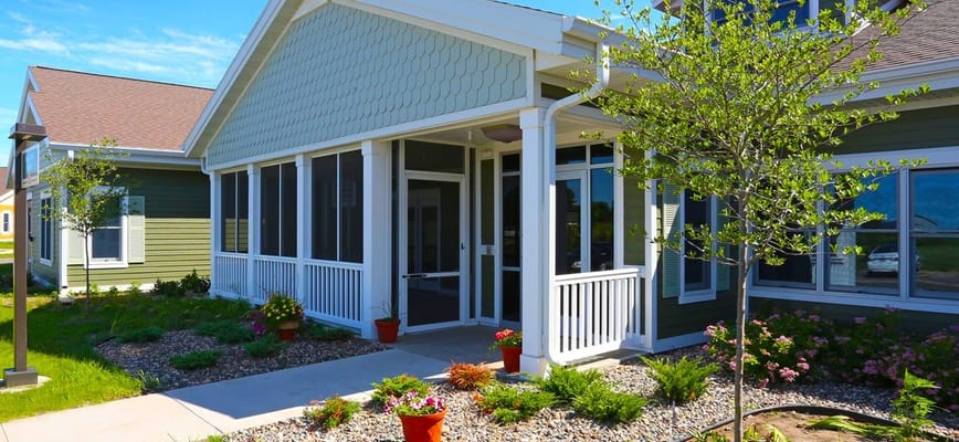 Entrance of the assisted living facility with landscaping