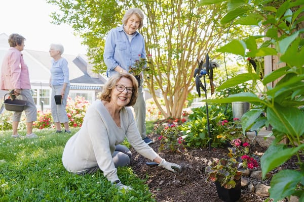 Residents gardening in the facility's outdoor space