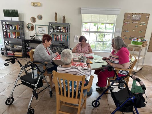 Residents playing bingo in a common area