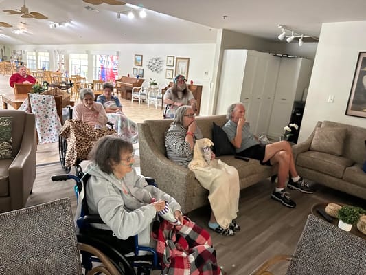Residents engaged in a common room activity