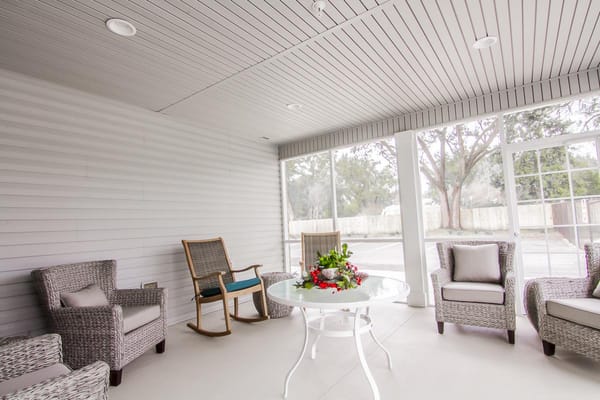 Outdoor seating area with a floral centerpiece