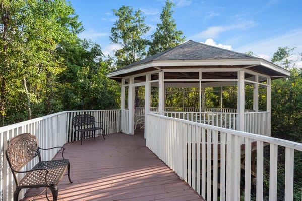Outdoor gazebo in a tranquil garden setting