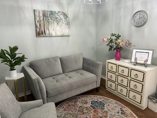 Cozy sitting area with a couch and decorative elements