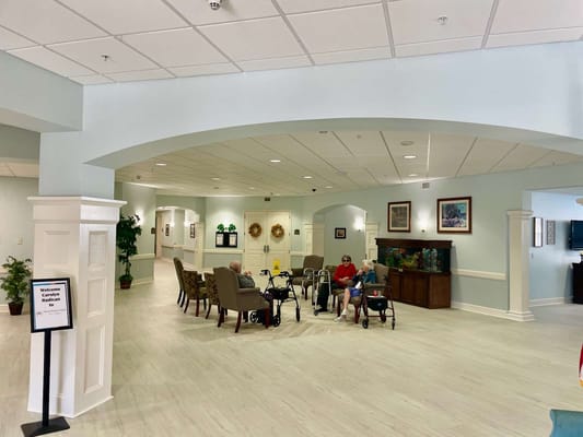 Residents socializing in a common area of the facility