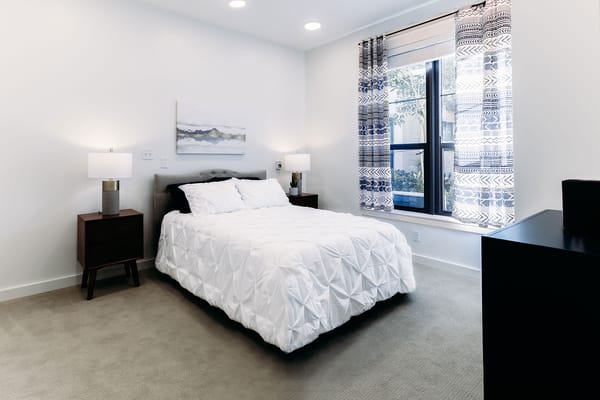 Bright and welcoming bedroom in a senior living facility