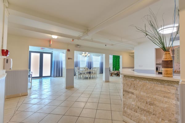 Bright, spacious common area with seating and decor