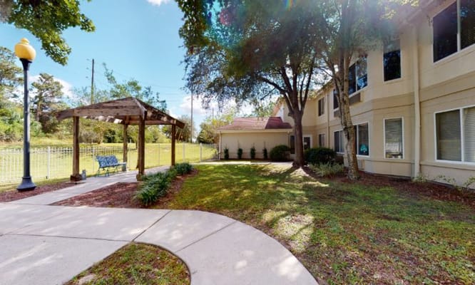 Outdoor space with gazebo and benches at the facility