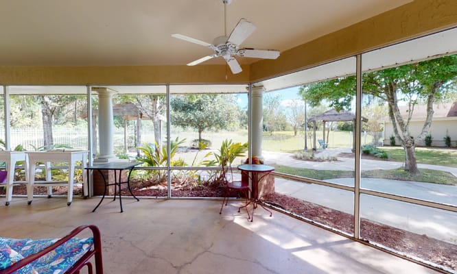 Sunroom with a view of the garden area